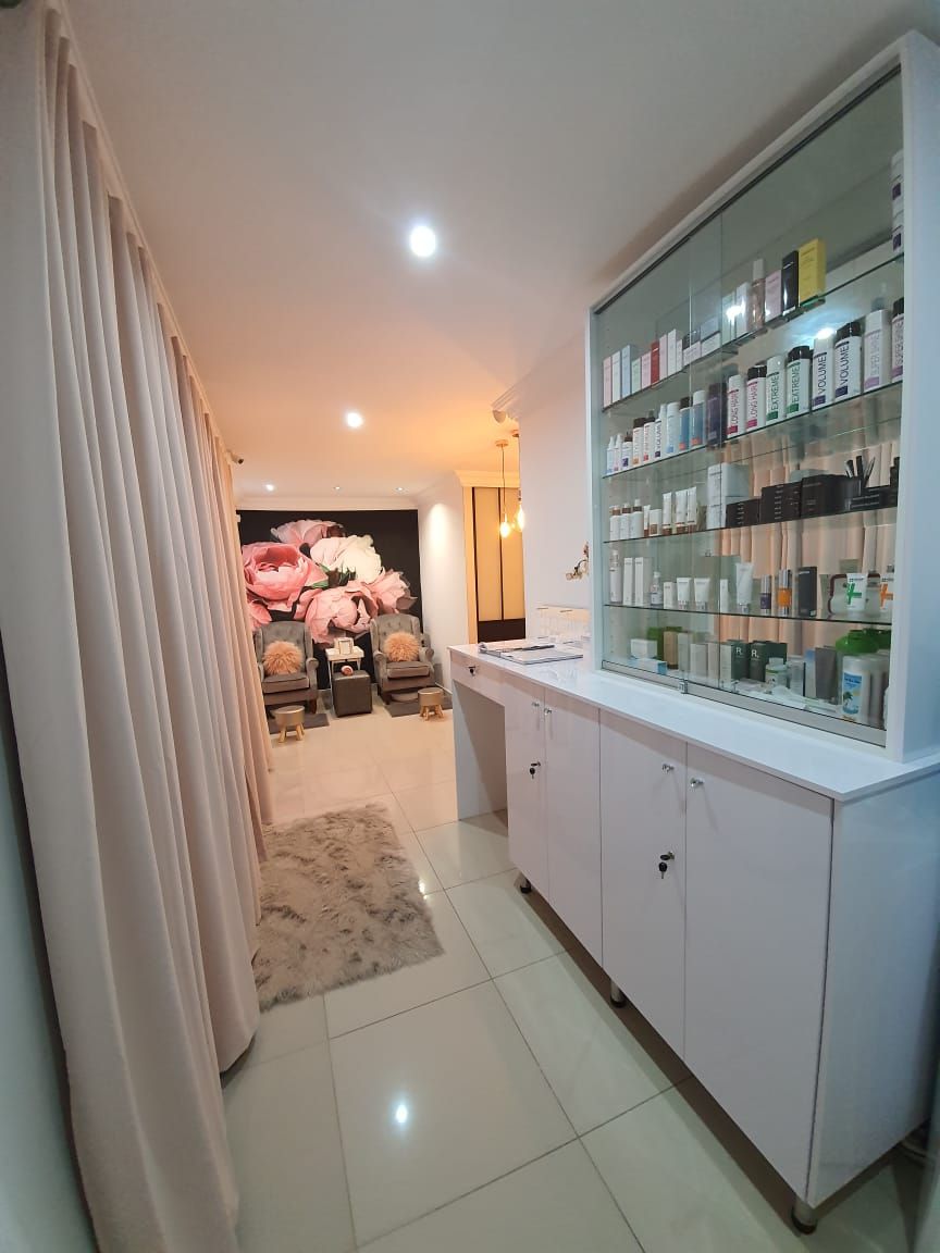 Reception and retail display inside Face & Body Studio SA